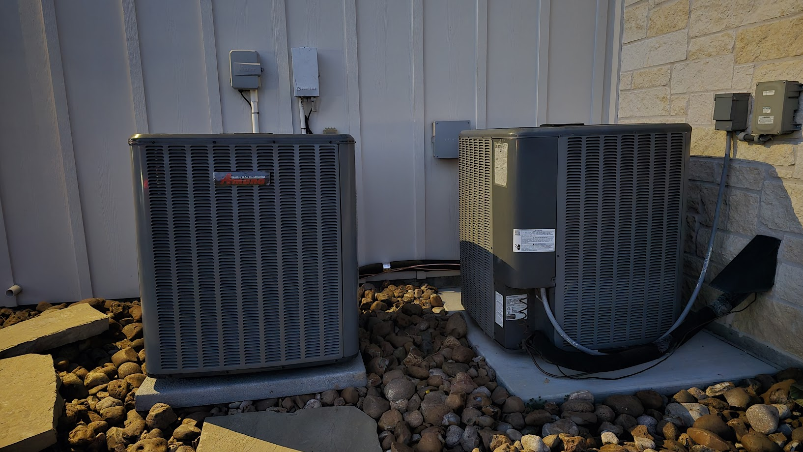 Residential AC condenser units serviced by ArcticPro